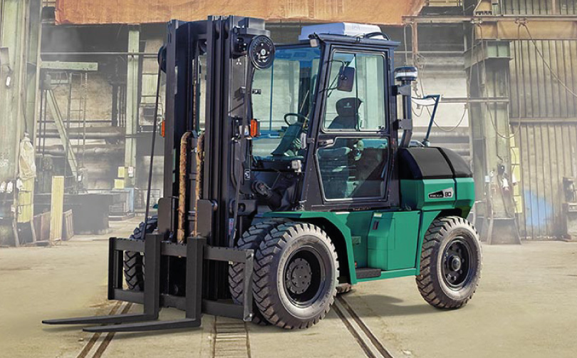 Forklift in front of a warehouse